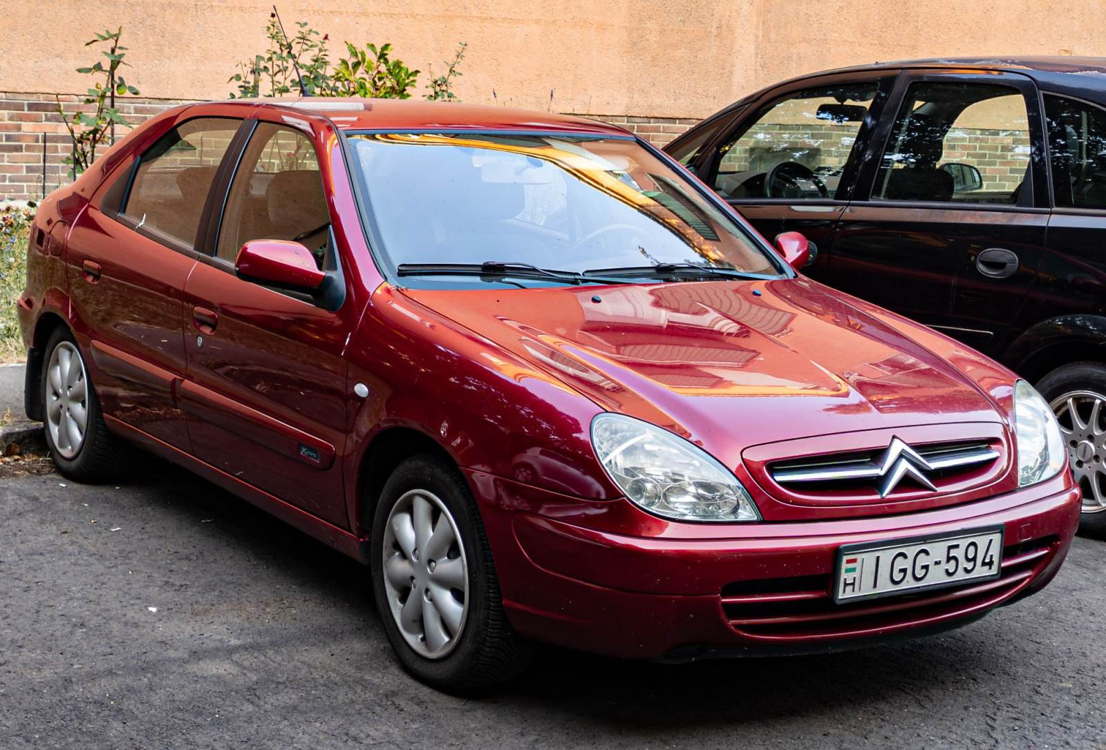 Citroen Xsara (Facelift) in Tiziano Rot, gesehen in August, 2024.