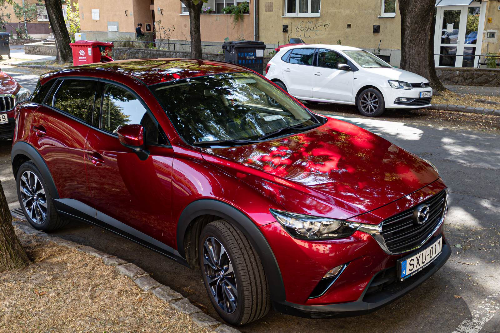 Mazda CX-3 in Sould Red, gesehen in August, 2024.