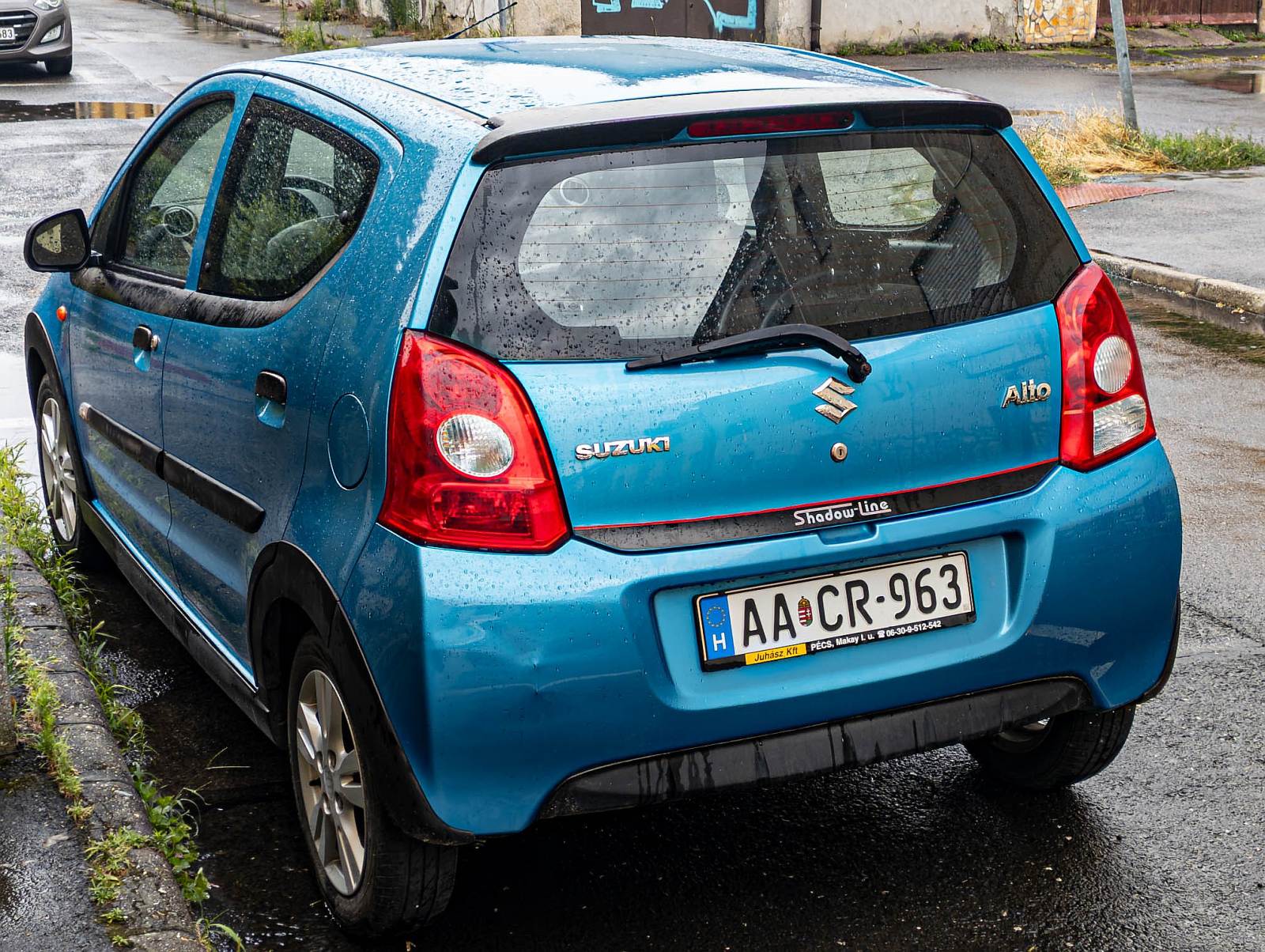 Rückansicht: Suzuki Alto GF (siebte Generation)  Shadow Line  Edition. Farbe: Paradise Blue. Foto: 07.2024