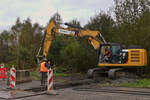 Raupenbagger Caterpillar 320 E LN, aufgenommen bei Straßenbauarbeiten.