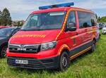 =MAN TGE der Feuerwehr ENNIGERLOH steht im Mai 2024 auf dem Besucherparkplatz der RettMobil in Fulda