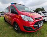 =Ford Transit Custom als MTF der Feuerwehr SPANGENBERG steht im Mai 2024 auf dem Besucherparkplatz der RettMobil in Fulda