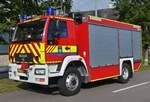 MAN Rüstwagen der Feuerwehr aus Echternach, steht für den Notfall, Einsatzbereit im Außenbereich, am Tag der Rettungsdienste in echternach. 22.09.2024