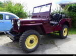 Oldtimer Roter Willys Jeep am Oldtimertreffen in Orpund/BE am 2024.06.23