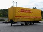 Tandem Anhnger mit DHL Express & Logistics  Pritscheplane in Herten abgestellt am 28.08.2012  