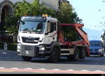 MAN Muldentransporter unterwegs in der Stadt Lausanne am 2024.07.26