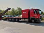 4 achser Actros 2541  von GMS mit Spezialaufbau zum Transport von Asphaltfrsen. Gesehen am 04.05.2011 in Aachen.