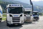 Zwei Scania von TGL und ein Volvo FMX von F.Ili Pasta SA die am 14.7.24 beim Trucker Treffen in Ambri stehen.