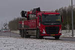 Volvo mit Kranaubau eines Baustoffhändlers, aufgenommen Nov.