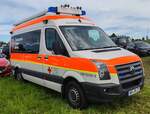 =VW Crafter des DRK BRACKENHEIM, gesehen im Mai 2024 auf dem Besucherparkplatz der RettMobil