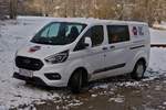 Ford Transit Custom, von Swietelsky, steht nahe einer Bahnbaustelle abgestellt. 04.2021