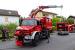 Feuerwehr Bad König (Odenwald) Mercedes Benz Unimog U5023 GW-L Kats mit den einzelnen Modulen am 18.08.24 beim Kreisfeuerwehrtag in Reichelsheim