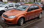 Chevrolet Lacetti Hatchback in Sunset Orange.