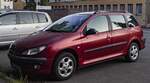 Diesen Peugeot 206 SW in Luciferrot habe ich in 05.2024 gesehen.