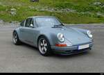 Grauer Porsche Stroeder 4.0 auf dem Parkplatz auf dem Sustenpass am 2024.09.08