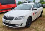 =Skoda Octavia der MALTESER, gesehen auf dem Parkplatzgelände der RettMobil 2024 in Fulda