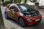 BMW i3 in der Farbe  Solar Orange , gesehen in August, 2024.