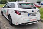 =Toyota Corolla Hybrid, steht im Juli 2024 in Karlsruhe