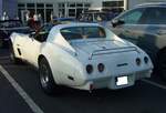 Heckansicht eines 1976´er Chevrolet Corvette C3 Sting Ray Targa im Farbton classic white.