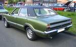 Profilansicht einer viertürigen Ford Taunus TC Limousine im Farbton onyxgrün aus dem Jahr 1973. Oldtimer-Revival auf dem Gelände der Kokerei Zollverein in Essen am 28.07.2024.