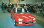 Opel Corsa A Irmscherumbau auf der Essen Motorshow 1990. Meine heutige Frau guckt ganz interessiert, weil sie sich gerade einen Corsa A bestellt hat, den sie brigens heute noch fhrt.