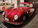 =Porsche 356, Bj. 1950, 1086 ccm, 40 PS, ausgestellt im Museum PROTOTYP in Hamburg, 09-2024. Das Museum schreibt: Dies ist der älteste noch existierende Porsche-Sportwagen  Made in Germany . Die Fahrgestellnummer 5006 kennzeichnet ihn als einer der allerersten Porsche 356 die in Deutschland gebaut wurden. Die Vergabe der Chassisnummer begann mit seinerzeit mit der Nummer 5001.