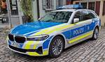 =BMW 5er als Dienstfahrzeug der bayrischen Polizei Polizeipräsidium Mittelfranken steht im Dezember 2023 in Rothenburg ob der Tauber