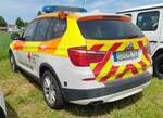 =BMW X3 vom BRK KV MAIN-SPESSART steht auf dem Parkgelände der Rettmobil 2024 in Fulda.