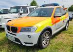 =BMW X3 vom BRK KV MAIN-SPESSART steht auf dem Parkgelände der Rettmobil 2024 in Fulda.