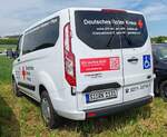 =Ford Transit Custom des DRK KV SIEGEN-WITTGENSTEIN steht auf dem Parkgelände der Rettmobil 2024 in Fulda