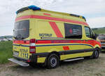 =MB Sprinter des DRK KV NAUMBURG / NEBRA steht auf dem Parkgelände der Rettmobil 2024 in Fulda.