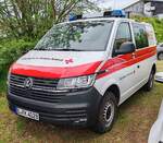 =VW T 6 vom DRK aus dem Raum Berlin, gesehen auf dem Parkplatzgelände der RettMobil 2024 in Fulda