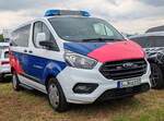 =Ford Transit Custom der JOHANNITER, gesehen auf dem Parkplatzgelände der RettMobil 2024 in Fulda