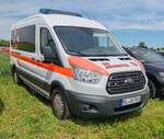 =Ford Transit der MALTESER steht auf dem Parkgelände der Rettmobil 2024 in Fulda