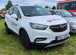 =Opel Mokka als Dienstfahrzeug der Malteser steht auf dem Parkgelände der Rettmobil 2024 in Fulda.