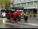 Karnevalfahrzeug der Gruppe  GUGGIROTSCH (Anschrift an der Front FORDSON des Fahrzeuges)  in der Stadt Luzern unterwegs am 2024.10.04