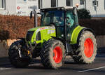 =Claas Arion 630 C ist unterwegs in Fulda bei einer der vielen bundesweiten Bauerndemos im Januar 2024