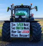 =John Deere 6R unterwegs in Fulda bei einer der vielen bundesweiten Bauerndemos im Januar 2024