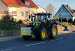 =John Deere 6R unterwegs in Fulda bei einer der vielen bundesweiten Bauerndemos im Januar 2024