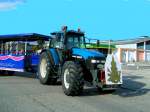 NEWHOLLAND-8560 aus dem Passauer Raum fhrt am Volksfestplatz in Ried ein; 080120