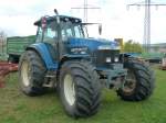 New Holland 8970 steht bei einem Landmaschinenhndler in 36088 Hnfeld, April 2011