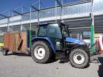 NEW-HOLLAND TL70 mit kleinem Viehtransportanhnger;110607