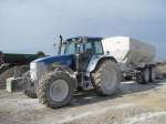 New Holland TM 190 auf einer Baustelle in der Nähe des Flughafens von Lüttich am 14.06.2009