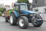 =New Holland TM 160 steht zur Getreideanlieferung auf dem Betriebshof der Raiffeisen-Warenzentrale in Hünfeld, 08-2019