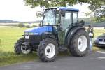 NewHolland TN 550 als Zaungast bei der Oldtimerveranstaltung des  Deutz-Club Allmus  am 30.08.09